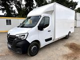 a picture of a white van parked in a lot
