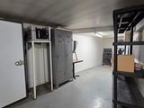 an image of a room with a lot of storage in it
