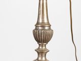 a lamp that is sitting on a table with a lamp on it