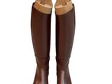 the boots are brown and brown with brown trims