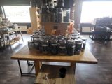a table with a lot of jars on it in a store