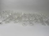 a lot of empty wine glasses on the table