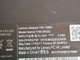 the back side of a laptop with a sticker on it