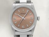 an image of a rolex watch with a pink dial on a steel bracelet