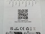 a sign with a qr code on it on the wall