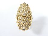 an image of a gold ring with diamonds on a white background
