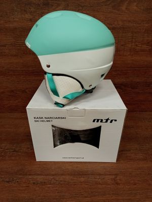 a helmet on top of a box on a table