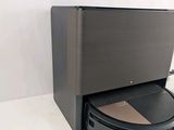 a robotic vacuum that is sitting on top of a table