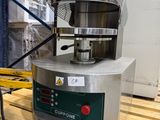 a machine that is sitting on a pallet in a warehouse