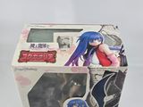 a box with a picture of a girl in a red dress