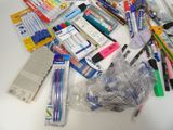many different types of toothbrushes and toothpaste on the table