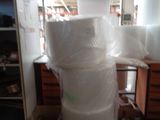 several rolls of toilet paper are stacked on top of each other in a store