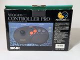 an image of a box with a controller in it on a white surface