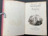 an open book with a drawing of a woman on it