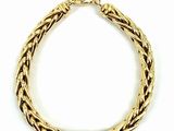 a gold bracelet with a braid design on a white background