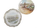 two plates with a picture of a city on them