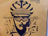 a poster of a man wearing a hat and sunglasses