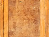 an old wooden picture frame on a white background with a brown background