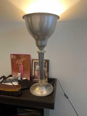 a lamp that is on top of a table
