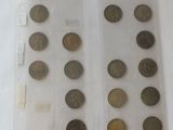 a lot of coins in a plastic bag on a table