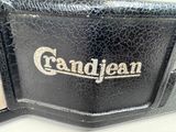 a close up of a black leather case with a logo on it