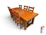 a wooden table with six chairs around it