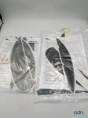 a pair of shoes and a pair of scissors on a table