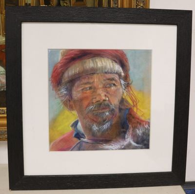 painting of a man with a beard and a red hat in a black frame