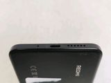 a close up of the back of a cell phone with a sticker on it