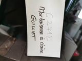 a tag on a machine that has a price tag attached to it