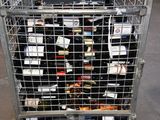many bottles of wine sitting in a metal cart