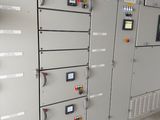 many electrical switches on the wall in the room