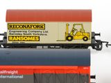two toy trains that are sitting side by side