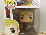 a close up of a pop vinyl figure in a box