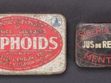 two tins of cyphoids are sitting on a table