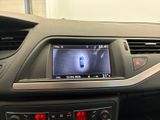 the dashboard of a car with a digital display in the center