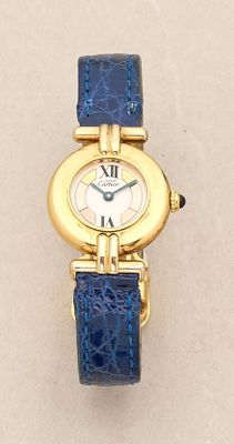 a gold watch with a blue strap around it