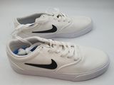 white and black nike sneakers on a white surface