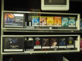 a lot of dvds on the shelves in the store