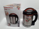 the box of the electric kettle is next to the box of the electric kettle