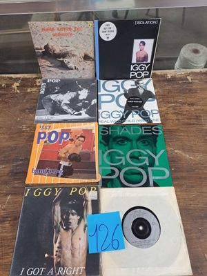 a lot of cds and cds on the table