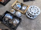 a lot of silver items that are sitting on the ground