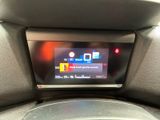 a display on the back of the seat of a car