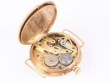 an image of a pocket watch with a gold case on a white background