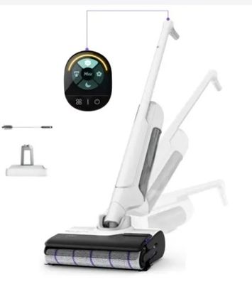 an image of a vacuum cleaner with a remote control on the side of it