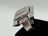 an image of a diamond ring on a black velvet ring holder