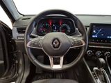 the interior of a car with a steering wheel, dashboard, and dash board