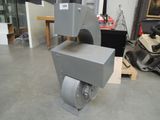 a machine that is sitting on the floor in a room