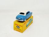a blue toy car sitting on top of a yellow box