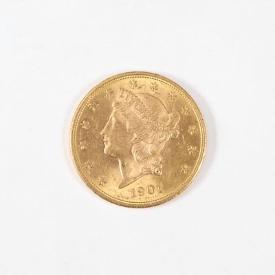 une pièce d'or ornée d'une tête de femme